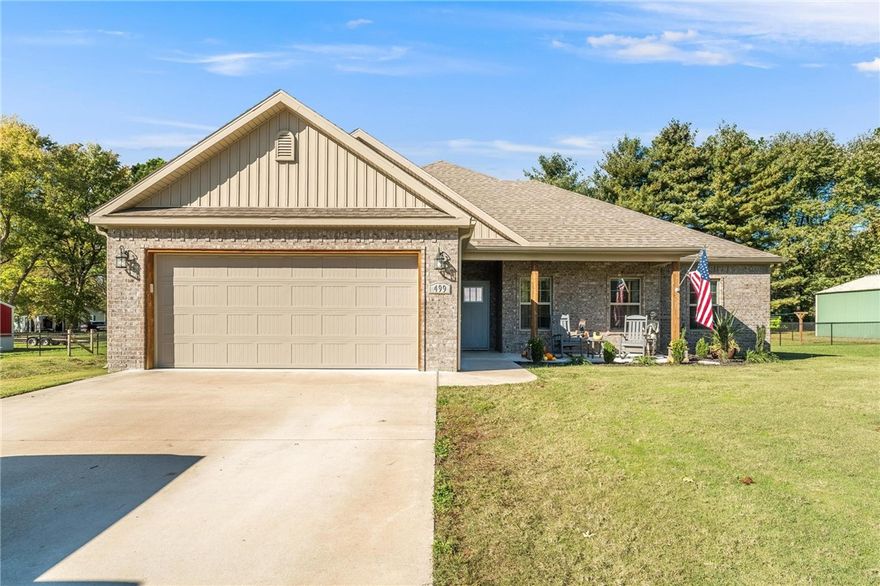 Looking for something with a bit more space than a tiny subdivision lot? Well here it is, situated on a large .79 acre lot with no HOA, easy access to main roads and just minutes from downtown Pea Ridge and downtown Rogers. There is plenty of room to expand or add a shop/detached garage. Featuring an open floor plan and split bedroom plan, lots of storage and cabinet space. The backyard is fully fenced and also has a fenced in garden area. Schedule a tour today