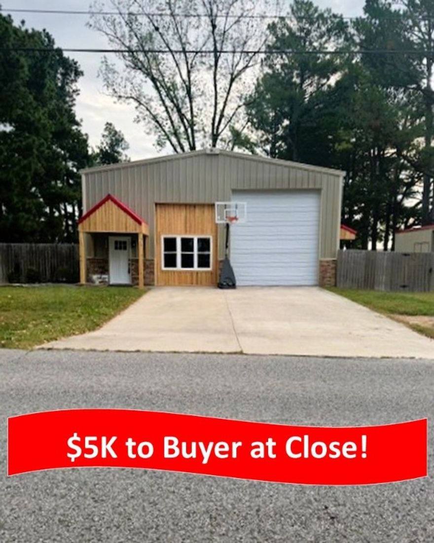 "Modern barndo living meets family comfort — with $5,000 to the Buyer at Close!" Discover the perfect blend of strength, style & comfort in this red iron barndominium. With 3 BR/2BA - 2,184 SF & a versatile bonus room, this home offers both function & charm. The kitchen boasts granite counters & sleek black stainless appliances, opening into spacious living & dining areas designed for gathering. Step outside & enjoy an outdoor kitchen ideal for entertaining, plus a hot tub (negotiable) for relaxation. A 20x10 shed provides plenty of space for lawn equipment, tools, or hobby storage, keeping everything neat & organized. The durable red iron construction ensures long-lasting quality while providing a modern, rustic aesthetic buyers love. Located near parks & within the highly regarded Prairie Grove School District, this move-in ready barndo has everything you need—and $5,000 in buyer incentives at closing makes it even better!