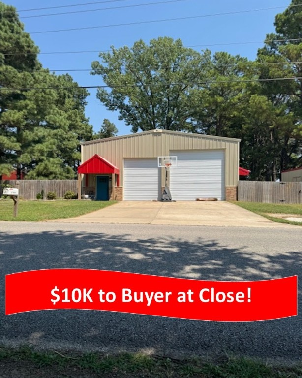 "Modern barndo living meets family comfort — with $10,000 to the Buyer at Close!" Discover the perfect blend of strength, style & comfort in this red iron barndominium. With 3 BR/2BA - 2,184 SF & a versatile bonus room, this home offers both function & charm. The kitchen boasts granite counters & sleek black stainless appliances, opening into spacious living & dining areas designed for gathering. Step outside & enjoy an outdoor kitchen ideal for entertaining, plus a hot tub (negotiable) for relaxation. A 20x10 shed provides plenty of space for lawn equipment, tools, or hobby storage, keeping everything neat & organized. The durable red iron construction ensures long-lasting quality while providing a modern, rustic aesthetic buyers love. Located near parks & within the highly regarded Prairie Grove School District, this move-in ready barndo has everything you need—and $10,000 in buyer incentives at closing makes it even better!