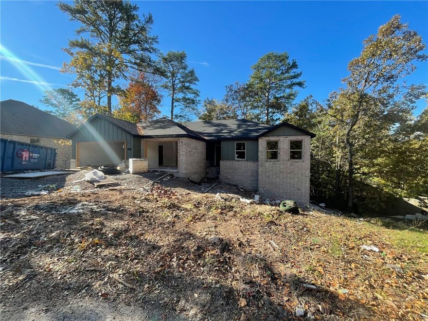 Brand new and move-in ready! This stunning new construction home offers 2,017 sqft of thoughtfully designed living space, featuring 4 bedrooms, 2 bathrooms, and a 3-car garage. Enjoy the privacy of a split floor plan and the benefits of energy-efficient construction and modern finishes throughout. Ideally located just minutes from Lake Norway, Highway 71, and the Bella Vista Country Club Golf Course, you'll love the easy access to recreation, shopping, and dining. Whether you're relaxing at home or exploring all that Bella Vista has to offer, this home combines style, function, and an unbeatable location.