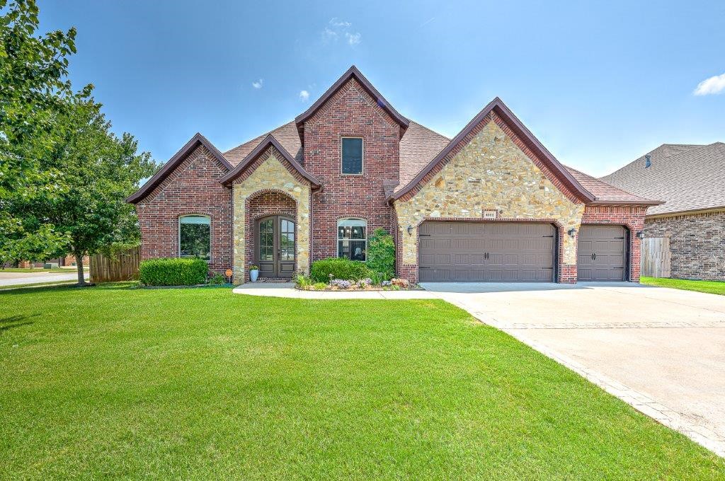 Magnificent curb appeal on a beautifully-landscaped corner lot in Brighton Heights subdivision! Quality custom features abound in this meticulously-maintained home! Enter stately, arched front doors to a vaulted foyer w/4th bedroom/office on the left & formal dining on the right. The living room, featuring gas log fireplace & built-ins, opens to the eat-in kitchen w/raised bar, island, butlerās pantry, & new gas cooktop flanked by pull-out spice racks. Off the kitchen are the laundry/mud rooms w/2-cubby drop station & master suite w/storm shelter beneath the closet floor. A lush backyard w/25x12 partially-covered patio w/fire pit is perfect for entertaining. As a bonus, the heated/cooled sunroom is not included in the sq footage of the home. Ascend the stairs to an upstairs landing/sitting area, large bonus room, & 2 more ensuite bedrooms. Neighborhood pool & playground conveniently-located one block west. Welcome home!