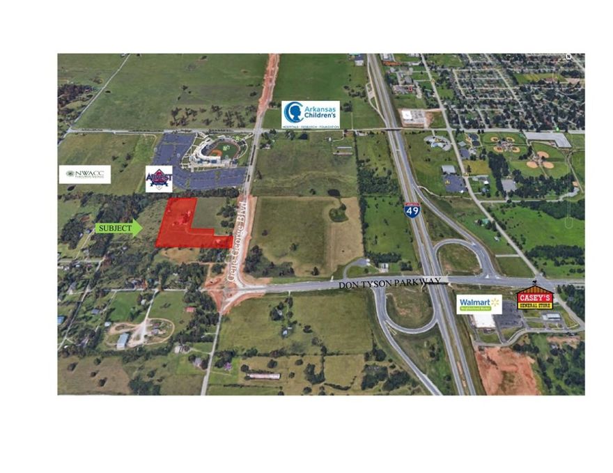 Huge development opportunity in Springdale Overlay Business District. 8.18+/- acres w/165' frontage on Gene George Blvd in Springdale Overlay District and can be rezoned to many opportunities. Retail, office, multi-family, etc... Close proximity to Children's Hospital, Arvest Ballpark, NWACC and proposed oncology clinic. Water, sewer and gas accessible.