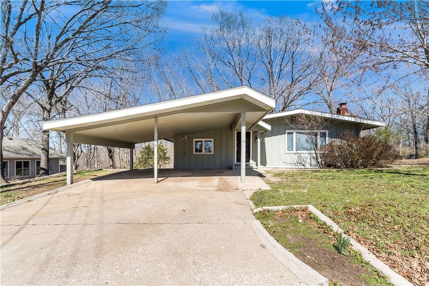 Welcome to this beautifully remodeled AND over-sized Bella Vista Bungalow! All new design with modern aesthetics....paint, fixtures, new kitchen & bathrooms, featuring a secondary living space and workshop! All of this and more sits on a large FLAT CORNER LOT. Great natural light lets you enjoy the peaceful serenity that only Bella Vista can provide. Come see this one-of-a-kind home today.