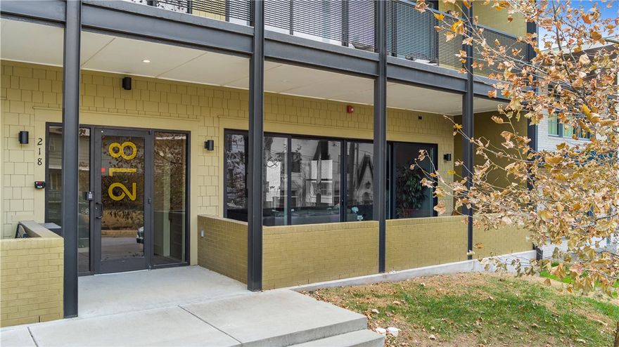 Rare opportunity to own a one-level, 2-bedroom, 2-bathroom condo with a detached 1-car garage just steps from Dickson Street and the Fayetteville Square! Built in 2019 by Mark Zweig, this open floor plan with 10-foot ceilings has updated finishes and amenities throughout. A wall of floor-to-ceiling sliding glass doors opens to the covered front porch on Church Avenue that is sure to be well utilized. When not in use, motorized custom shades provide privacy and convenience. The outdoor living is connected to the open kitchen, dining, and living space. A walk-in pantry and walk-in laundry room near the kitchen offer plentiful storage and functionality. Large bedrooms, each with their own ensuite bathrooms, include tall ceilings and custom fit Levelor window treatments. A private detached garage conveys with the unit - a luxury amenity amongst condos and townhomes downtown. If you've been looking for a high-end, low-maintenance, well-designed property in the Fayetteville entertainment and arts district, this is it!