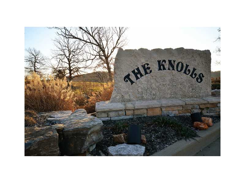 Surround yourself in an upscale subdivision and enjoy the natural beauty of the Ozarks! The Knolls offers the serenity of spacious lots nestled against the foothills in Northwest Arkansas and embraced by gently rolling terrain and spectacular views. You c