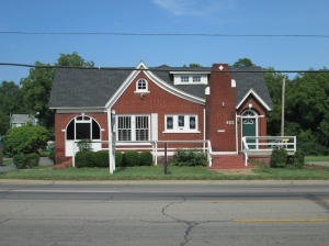 422 S Arkansas ave - Nice red brick English style cottage with large parking lot. Hardwood flooring. Being sold ''as is''. Residence or business. Realtor owned. $149,900 mls# 15-1973
