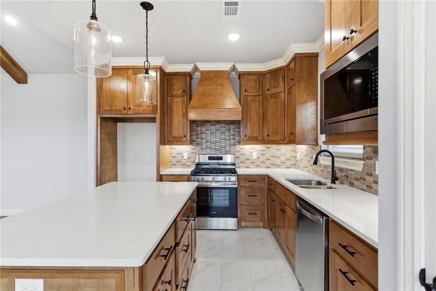 Discover Comfort & Style — without the wait! Only 1 year old, this 4-bedroom home is truly move-in ready! Thoughtful upgrades inside and out and is located in a peaceful neighborhood with no homes directly behind for added privacy. Centrally positioned for easy access to conveniences from multiple directions, you’ll love both the setting and the layout.

Enjoy a welcoming covered front porch, brick exterior, and a spacious backyard with a large patio featuring gas grill and TV connections. Inside, the living room shines with soaring ceilings, beam treatments, a cozy fireplace, and custom built-ins. The kitchen stands out with custom cabinetry, a large island, sleek counters, and a custom vent hood.

The primary suite is a true retreat with a coffered ceiling, spa-like bath with double vanity, relaxing tub, large shower, and walk-in closet. A smart split floor plan offers 3 additional bedrooms for flexible living.

Don’t miss your chance to call this one home—schedule your showing today!