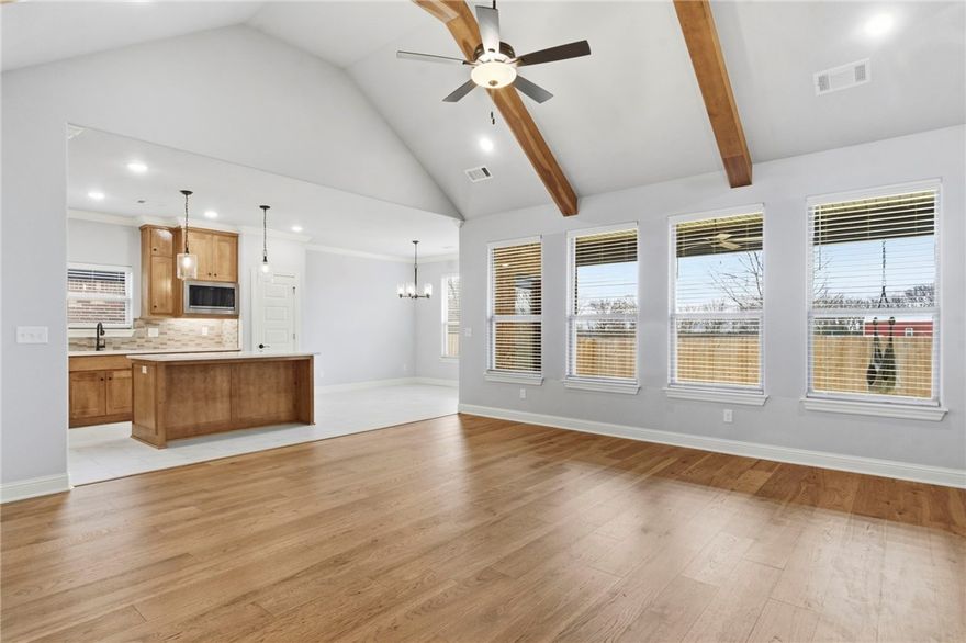 Discover Comfort & Style — without the wait! Only 1 year old, this 4-bedroom home is truly move-in ready! Thoughtful upgrades inside and out and is located in a peaceful neighborhood with no homes directly behind for added privacy. Centrally positioned for easy access to conveniences from multiple directions, you’ll love both the setting and the layout.

Enjoy a welcoming covered front porch, brick exterior, and a spacious backyard with a large patio featuring gas grill and TV connections. Inside, the living room shines with soaring ceilings, beam treatments, a cozy fireplace, and custom built-ins. The kitchen stands out with custom cabinetry, a large island, sleek counters, and a custom vent hood.

The primary suite is a true retreat with a coffered ceiling, spa-like bath with double vanity, relaxing tub, large shower, and walk-in closet. A smart split floor plan offers 3 additional bedrooms for flexible living.

Don’t miss your chance to call this one home—schedule your showing today!