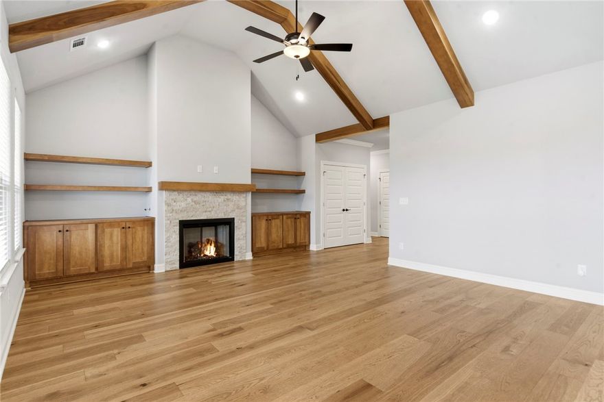 Discover Comfort & Style in Edgewood Estates!
Only 1 year old, this 4-bedroom home is filled with thoughtful upgrades inside and out and is located in a peaceful neighborhood with no homes directly behind for added privacy. Centrally positioned for easy access to conveniences from multiple directions, you’ll love both the setting and the layout.

Enjoy a welcoming covered front porch, brick exterior, and a spacious backyard with a large patio featuring gas grill and TV connections. Inside, the living room shines with soaring ceilings, beam treatments, a cozy fireplace, and custom built-ins. The kitchen stands out with custom cabinetry, a large island, sleek counters, and a custom vent hood.

The primary suite is a true retreat with a coffered ceiling, spa-like bath with double vanity, relaxing tub, large shower, and walk-in closet. A smart split floor plan offers 3 additional bedrooms for flexible living.

Don’t miss your chance to call this one home—schedule your showing today!