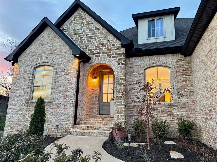 Beautifully updated Stone Mountain home is move-in ready.  Recent renovations to kitchen and primary bath enhance both style and function.  Main level offers 3 spacious bedrooms, including the primary, plus a dedicated office. Upstairs, a private 4th bedroom suite has a 2nd living area and full bath that can be closed off from the rest of the home — perfect for the noisiest occupants!  The kitchen is a gorgeous showstopper with designer finishes, new countertops, Kucht gas range, and chic coffee bar. The touch-faucet is a game-changer, adding ease to everyday tasks. Vaulted ceiling adds extra grace to the open living area.  Step outside to enjoy the large covered patio and serene backyard.  Practicality meets convenience in the 3-car garage with clever "Yours and Mine" layout, built-in cabinetry, offering ample storage and parking options.  From the grand stone entry at Hwy 265, enjoy the curving drive up the mountain to arrive at this very special community!