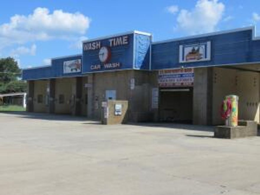 ROLLING IN THE REVENUE WITH SOAPS & SUDS! Priced to sell!  In very good condition and hosts a high profile location! 5 SELF SERVE bays, one AUTOMATIC bay (LASER WASH 4000)!  6 covered vacuum bays. Equipment is maintained by an onsite technician and car wash vendors. ***NEW TANKLESS hot water heaters.  The established, onsite technician is available at hourly rate--he can also maintain bay clean outs. Lucrative, established business--perfect for boats, trucks, and trailers. Small office -heated and cooled with half bath. See PRIVATE REMARKS.