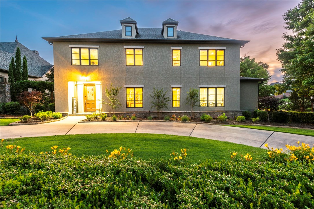 STUNNING HOME WITH GOLF VIEW! This 5 bedroom immaculate home in the coveted subdivision of Shadow Valley has amazing views overlooking the 3rd hole. French-inspired with a neutral color palette this home is everything you have been looking for! From the antique wood & stained-glass front door, head inside to 10' ceilings on the main floor with an open concept living room with floor-to-ceiling windows, fireplace, and wood floors. Flow into the eat-in kitchen featuring marble backsplash, soapstone countertops & large center island perfect for entertaining. Relax & rejuvenate in the main floor primary bedroom with a sitting nook and private ensuite feat: an oversized spa-like bathroom & large walk-in closet. Upstairs enjoy a built-in library with a rolling ladder, 4 bedrooms, 2 full baths & large bonus/media room with views! Host unforgettable events this summer from the patio or screened-in 24X12 patio with the scenic views of the golf course and sunsets! This home is a must-see! Schedule a private tour today!