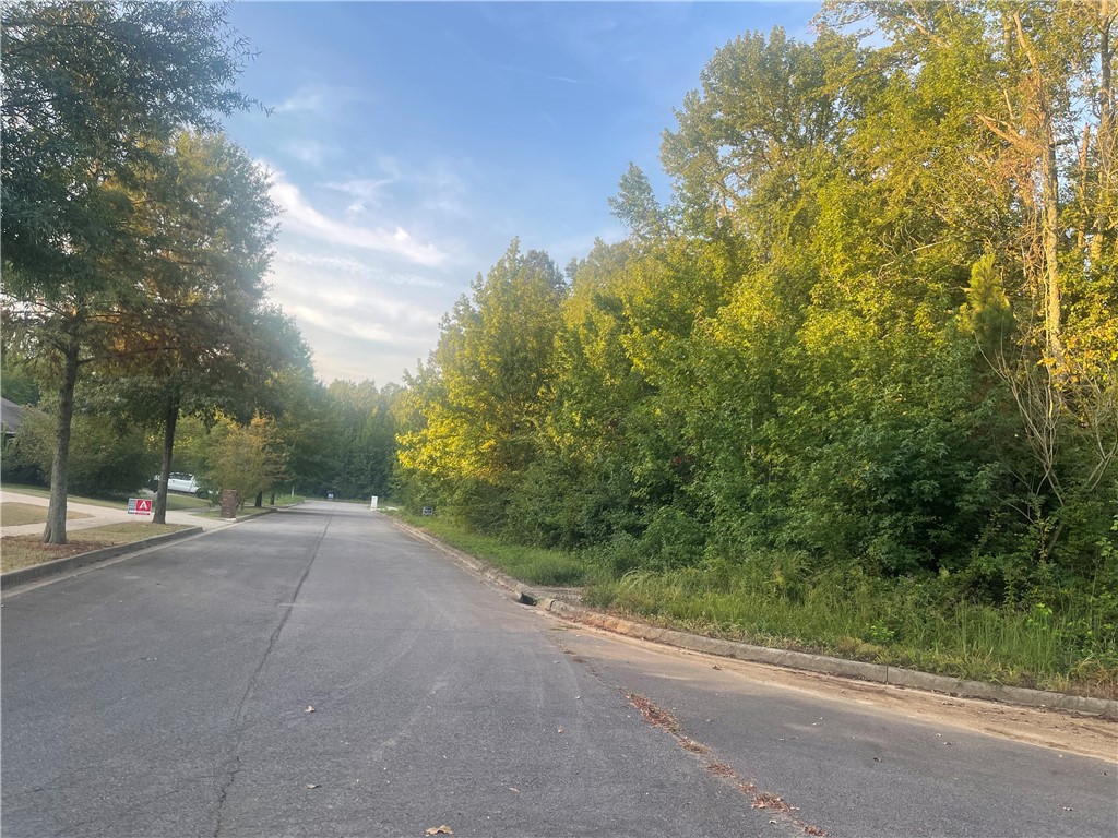 BUILD YOUR FUTURE HOME HERE! Premier lot is strategically located in a quiet, "end of the road" area. Low traffic and serene setting will allow you to enjoy a tranquil site to enjoy life. Curb and gutter, underground utilities, and paved roads make this truly builder ready! Close proximity to eateries, public schools, easy access to Interstate 40, if you are a daily commuter.