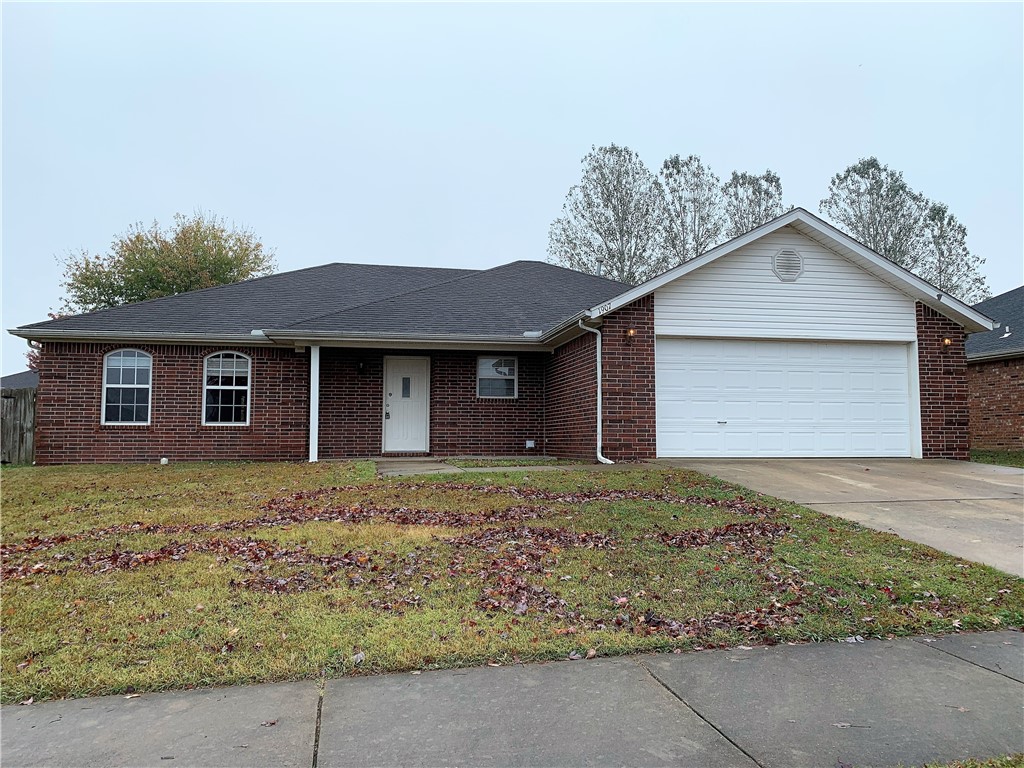 Very Nice 3 bedrooms, 2 full bath home in the Windwood Subdivision. Newer grey paint throughout home. Newer carpet in all bedrooms and new laminate wood throughout living room and hallways. Features include Split floor plan with huge Master with his/hers walk in closets. Fireplace in living area. 2 car garage, large privacy fenced backyard.
