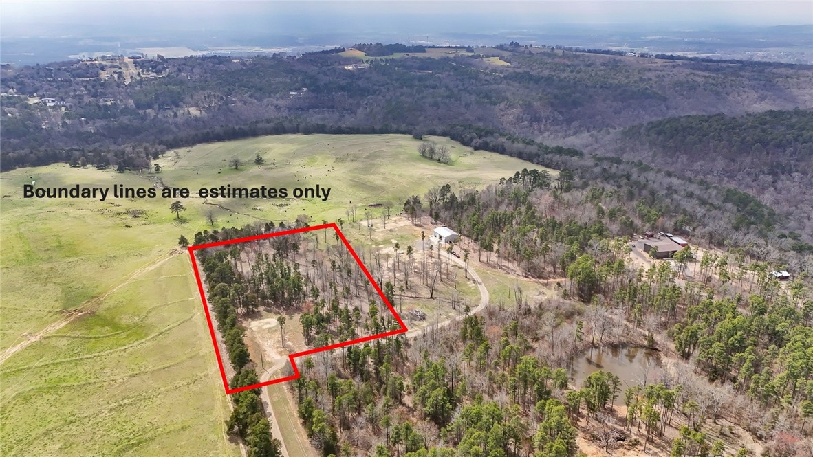 Your search for land to build your dream home is at the end of this private drive on Crow Mountain in Pottsville. Public water and electricity at the road and a nicely cleared area is ready for your home building plans. Peace and privacy come with this 5 acres. Plenty of room to start your own garden or just enjoy the panoramic view. About half of a pond is on the property along with a wet weather creek. Convenient to I-40 and Russellville amenities, yet that rural atmosphere. Get out to see this one asap.
