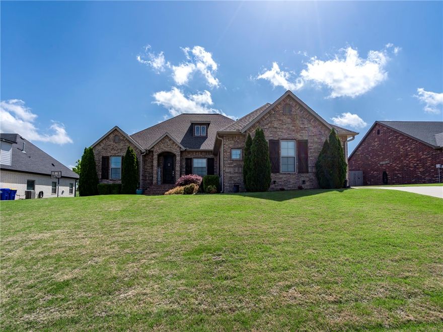 Stunning, custom built home featuring an open concept with a built-in entertainment center, extensive trim package and beautiful hardwood floors. The upgraded cabinets add a touch of elegance to the spacious kitchen. This home offers four bedrooms, three baths, a large bonus room for extra living space, and a three-car garage for convenience. Enjoy outdoor living on the patio overlooking the large backyard, perfect for entertaining. Desirable location to shopping, I49, and airport. Don't miss the opportunity to make this your dream home! Home is agent-owned.