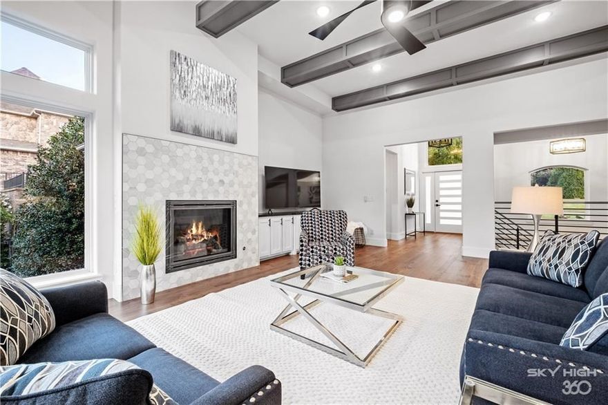 Welcome To Your Next Home! And WOW, What a Showstopper! Located Within The Private Gated Pinnacle Community And Situated On a 1/2 Acre Lot, This Homes Has just Been Completely Transformed And Is Ready To Welcome You. Filled With Custom High-End Finishes, Nothing Was Left Untouched And No Detail Was Overlooked. Spacious And Inviting From The Moment You Walk In With Open Living Area, High Ceilings, Custom Staircase, Chefs Kitchen With Professional Grade Appliances, Eat-In + Formal Dining And Large Island With Bar Seating. Master Suite With Luxury Master Bath Featuring A Fabulous Custom Shower, Free Standing Soaker Tub And Large Walk-In Closet. Laundry/Utility Room, 1/2 Bath And Secondary Bedroom With Full Attached Bath Round Out The Main Level. The Fabulous Continues On The Lower Level With A Second Full Living Area With Fireplace, Bar, Custom Office, And 2 Additional Bedrooms Each With Full Attached Bath. Large Deck And Lower Patio Overlook A Fantastic Backyard Just Waiting For A Pool! It's All Here! Come See Today!