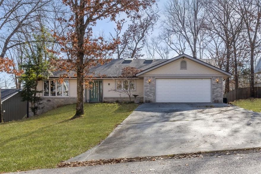 Heart of Bella Vista!  Amazing Location!  Center of Bella Vista! Bright, Close to Riordan/Kingsdale center with swimming pools, tennis, 2 golf courses, exercise, dining.  gathering in Riordan hall for community events and much more! Home is open & spacious living, dining, kitchen. lots of cabinets=lots of storage, a room just off the kitchen could be used as a great pantry or office! Family Rm/living area w/ high ceiling, wood beams, fireplace & wall of additional cabinets w/ hidden wet bar. Formal DR could be used as an Office. Extra large primary bedroom with large walk in closet. Primary bath Enjoy the large whirlpool tub and separate shower. Double vanity, tile floor.  Home used as a 3 bedroom but is on 2 Bedroom septic, extra living area with door has been used as 3rd Bedroom. Screened covered deck plus large open deck. Half bath in the utility room with sink. Extra large Garage. Nice sized tiled entry has nice light.Amazing wall of art work! Seller is motivated to move!