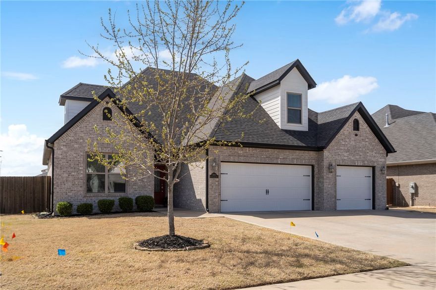 Welcome to 5500 W Lakewood Drive in SW Rogers - an impeccably maintained, one-owner home that is move-in ready. Located on a corner lot, you will love being able to walk across the street to Janie Darr Elementary School and to Mt Hebron Park right down the street. The main level features the primary bedroom and ensuite bath with dual vanities, soaking tub & walk-in shower, 2nd guest room or office, & an open kitchen with bar seating, a 5-burner gas cooktop, & a walk-in pantry. A spacious laundry room connects to the primary closet for added convenience. On the second level, you’ll find 2 bedrooms plus a large bonus room that could be a 5th bedroom. The only carpet is on the stairs! There are multiple upgrades in this home you do not want to miss, including a pot filler in the kitchen, tiled walls in all guest bathrooms with bath inserts, dual shower heads in the primary shower, and more.  You’ll love the location, just minutes from shopping, dining, I-49, and everything NWA has to offer! TVs and mounts convey