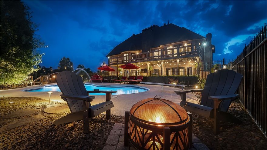 Welcome to Paradise! Through these double doors, this estate home has many flexible spaces for you to decide how to use them! On the main level you will find an office/study, living room, open kitchen with 48" cooktop/grill, double ovens and soft close cabinetry, breakfast area, formal dining, primary suite, second bedroom suite, laundry w/sink, half bath and access to deck. Upstairs there is a loft area, 3 bedrooms (or two bedrooms and a bonus), and a full bath.  The walk out basement houses entry to the additional garage space and storm shelter, amazing living area/media room with fire place and equipped wet bar, many storage areas, an actual finished storage room, a game room that could be an additional bedroom with access to the outside and a full bath. Step outside and find a covered patio space, a koi pond, expansive lawn and gorgeous pool with a depth up to 10', tan deck, diving board. New roof, windows, some of the doors. Gorgeous ceiling heights with beautiful wood features. This one has it ALL!