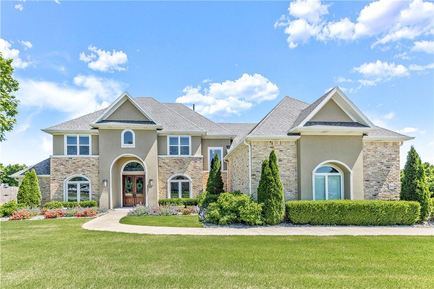 Pool, check. Prime location, check. Bentonville school district, check. Theatre/game room, check. Office, check. Top of the line Thermador appliances, check. Entertainers dream home, double check! This home really does HAVE IT ALL! Beautifully cared for one-owner home in desirable Otter Creek subdivision, this home offers incredible privacy with .82 acres of land surrounded by protected land creating the feeling you are out of town all while being right in the heart of NWA. The rock accents, wood beams and cool color tones will make you feel right at home the moment you walk through the door. Be sure to come over to see it in person because the features of this custom home is a long list & you have to see it for yourself! Come join us at this diamond property for the *Open House on June 5th from 1:00 PM - 3:00 PM