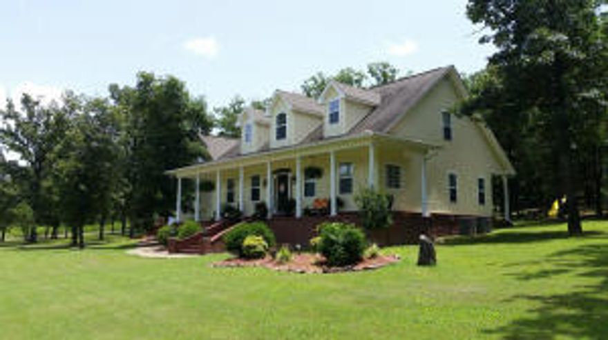 Custom built this home in 2004. Sits on approximately 1.5 acres. It has 2,446 square feet. It has 3 bedrooms plus a bonus room above garage, 2 full bathrooms and one 1/2 bath. It includes gas fireplace, jacuzzi tub, breakfast area in kitchen and separate dining room, as well as covered front and back porches. Custom built wooden playset in tree-covered backyard.