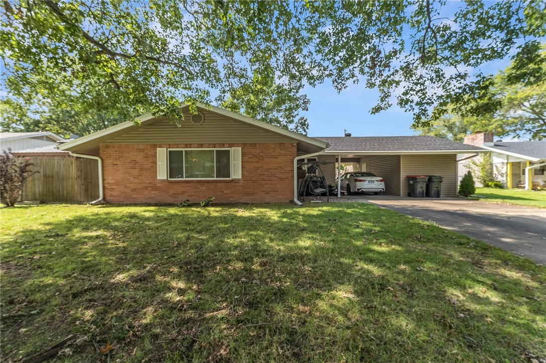 Great house in a terrific location! The house features a completely remodeled bathroom with walk in shower and granite counter top, a spacious family room and 2 good sized bedrooms. Main bedroom has 2 walk-in closets. The level fenced backyard comes with a gazebo and a garden spot. A heated/cooled shop area is attached to the carport. Both the roof and water heater have been replaced in the last 5 years.