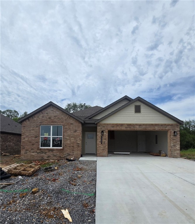 Welcome to Heritage Ranch, Phase 4! This new phase is presented by an award-winning builder with over 35 years of experience in Northwest Arkansas, committed to delivering quality homes for years of enjoyment. This home features three spacious bedrooms, two bathrooms, and an open kitchen seamlessly flowing into the dining and living areas. It boasts a vaulted ceiling and a cozy fireplace. Enjoy stylish finishes and amenities, including brick and hardie siding, cedar shutters, full guttering, LED disk lighting with fan and light kits in all bedrooms, a spacious kitchen island with pendant lights, 3cm quartz countertops, a smart thermostat, a Frigidaire Gallery appliance package, and more! This home combines style, comfort, and the convenience of nearby schools, shopping, and other amenities.