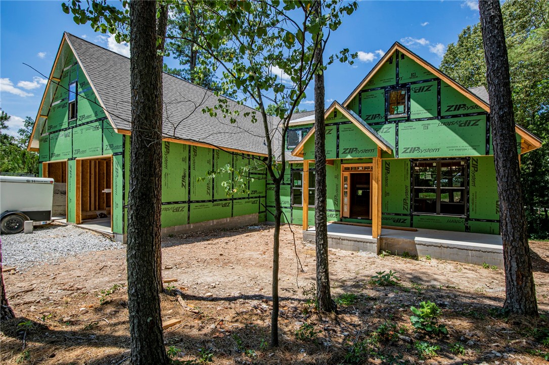 Introducing an exceptional new construction project, slated for completion on 9/30/2023.
This remarkable home nestled in towering trees captivates with meticulous design, blending the builderās favorite features & an impeccable layout. Carefully considered details include an inviting 2-sided gas fireplace, abundant windows for natural light & tree views. You will adore the nearby Down Under Bike trail & screened-in porch with a cozy fireplace. The kitchen inspires with an oversized island, wine rack, coffee bar, CafĆ© appliances, & quartz countertops. Split floor plan, vaulted ceilings, mahogany front door, & coffer ceiling add elegance. Flexibility with 3 bedrooms, 3.5 bathrooms, office, upstairs bonus room, & storage solutions. Outside, youāll find charming stone wainscoting. Enjoy convenience with a partial concrete crawlspace for bike storage & nearby exterior water faucet.
Secure your dream home today or future Airbnb.