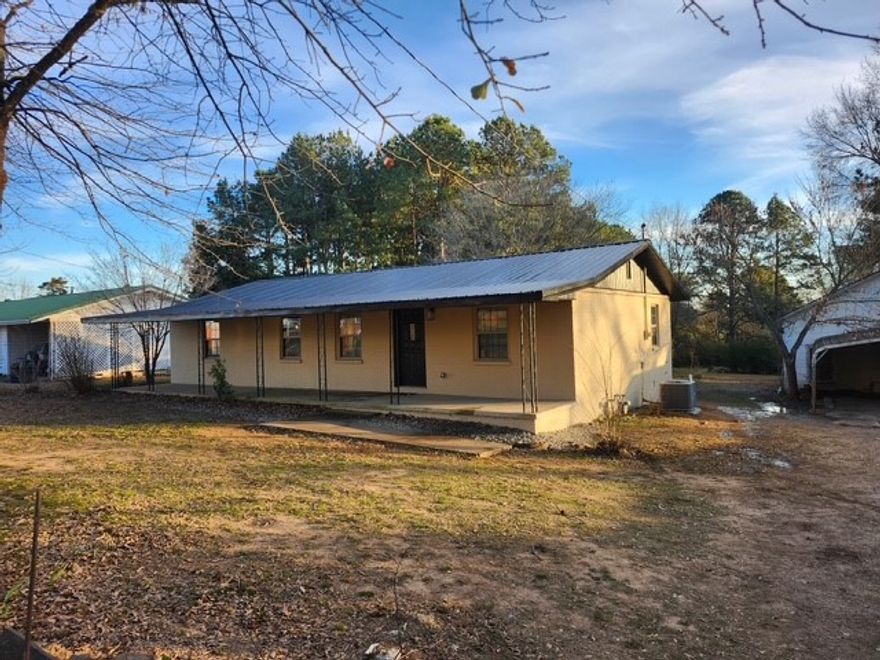 Beautifully remodeled 3 bed 2 bath home walking distance to Lamar schools! 1.00+/- Acres, 1421sft+/- 3 bed 2.5 bath w/master suite, laundry room, living room and eat in kitchen with island bar, ranch floor plan andbutcher block counters. ZERO DOWN eligible and move in ready! Spacious 1300 sft storage building, NEW: HVAC, roof, windows, attic insullation, waterproof luxery vinyl flooring, new sheetrock, paint, new appliances, new plumbing and electirical fixtures, vapor barrier, tons of ENERGY EFFICIENT LED lighting! Just a short drive to schools, shopping and work. Huge yard with large trees and outbuildings and a storm cellar!! Nothing in this price range compares, call for your private showing today!