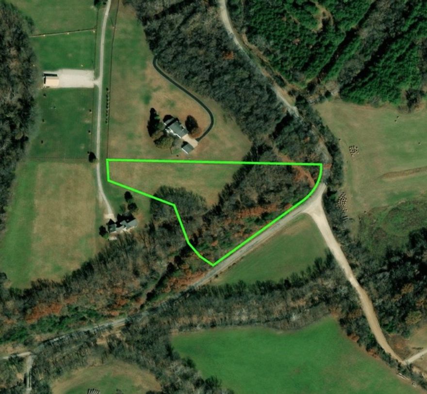 No covenants! If you're looking for a place for your estate, you've found it. Cleared lot with a beautiful backdrop, this oasis will allow you to build the home of your dreams and then some. Imagine being surrounded by lush foliage on a quiet road. This private acreage is your escape.