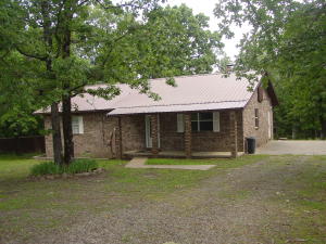 PIRATE COUNTRY Country living is where this cute little 3 BR 2 BA home sits. Home is in Dover Pirate School district and sits on 1.5 acres at the end of a quiet road. Come enjoy the evenings on the covered back porch gazing into the woods or go cut some wood to stay warm with the in house country living fireplace in the oversize living area. Please come see all the new updates from new paint on the walls to new carpet on the floor and new metal roof. You will fall in love with it.