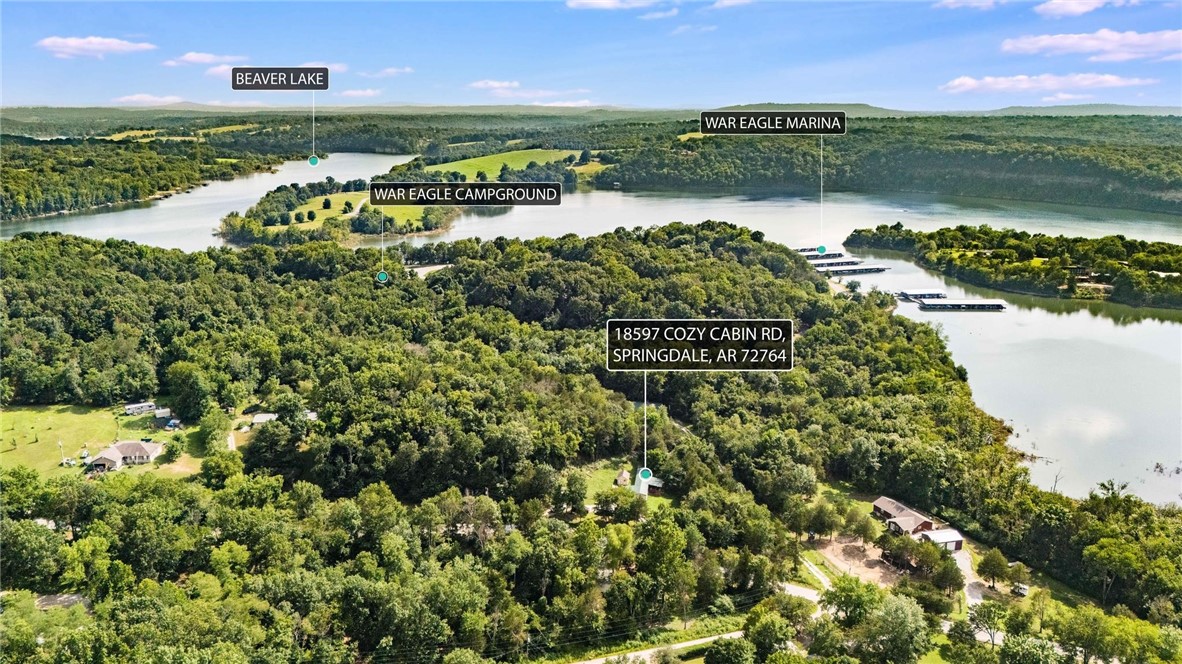 3+ secluded acres just around the corner from War Eagle Public Use Area! Tucked away on a peaceful stretch of wooded acreage, this beautifully updated manufactured home offers the perfect blend of privacy, comfort, and outdoor access. Featuring modern upgrades throughoutānew flooring, fresh paint, granite counters, updated kitchen and bathsāthis move-in ready home is a serene retreat surrounded by nature. The spacious lot offers room to roam, garden, or simply enjoy the quiet under a canopy of trees. Located just minutes from the lake and multiple public access areas, youāll have quick access to fishing, boating, and all the water recreation you love. Whether you're looking for a full-time residence or a weekend getaway, this property provides the ideal balance of seclusion and convenience. Enjoy country living with the lake life just around the corner!