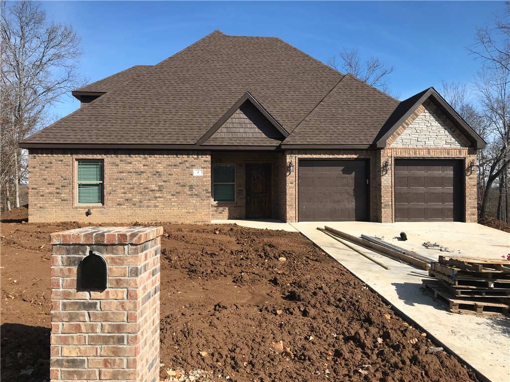 New Construction by RLP Investments. 4 bed, 3 bath home featuring custom cabinets, granite tops, fireplace, covered deck, stainless steel appliances, eat-in kitchen, tile walk in shower, landscaped front yard, keyless entry, 1 year builder warranty, buy now and pick your colors and flooring!