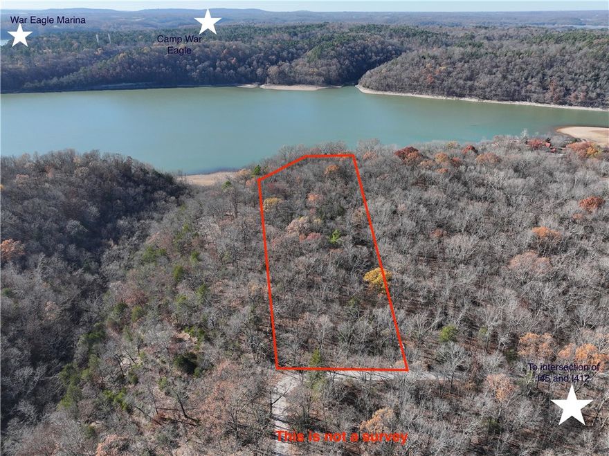 Buildable 5 acre lot with gorgeous lake views. The lot sits on a level ridge top that slopes into Beaver Lake on the western side. There is a private drive that runs the length of the property.  Electricity is located nearby.  Lots of privacy with this property along with multiple options for a location to build your new home.   

Electricity is located nearby. Lots of privacy with this property with no other builds in sight. A great
location for a luxury build or a weekend getaway. Deeded to the Core line