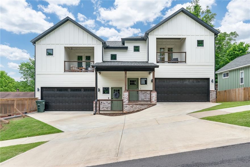 Nestled in the heart of downtown Fayetteville, this stunning duplex presents a unique opportunity to own
a modern, income-generating property in one of the city’s most desirable locations. Each unit features 3
bedrooms and 2.5 bathrooms with open-concept layouts, granite countertops, high ceilings, walk-in
closets, and private covered balconies ideal for relaxing or entertaining. Whether you're an investor
seeking premium rental income or a buyer looking to live in one unit while leasing the other, this
property offers flexibility and long-term value. Enjoy walkable access to the University of Arkansas, the
cultural experiences of the Walton Arts Center and TheatreSquared, the buzz of Dickson Street, and the
community charm of the Fayetteville Farmers Market. With its stylish finishes and unbeatable location,
this property is a standout opportunity in the downtown core