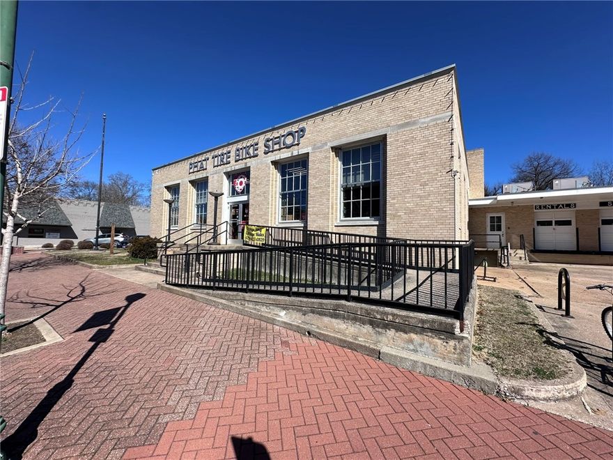 Historic building located on the corner of S Broadway St and E Central St in the heart of downtown Siloam Springs.  Situated in an Opportunity Zone.  Loading dock area with 3 roll up doors.  Many of the building's historic features have been preserved.  Two blocks from the Twin Springs Park to the south and two blocks to the City Park to the west. Surrounded by numerous shops and restaurants.
