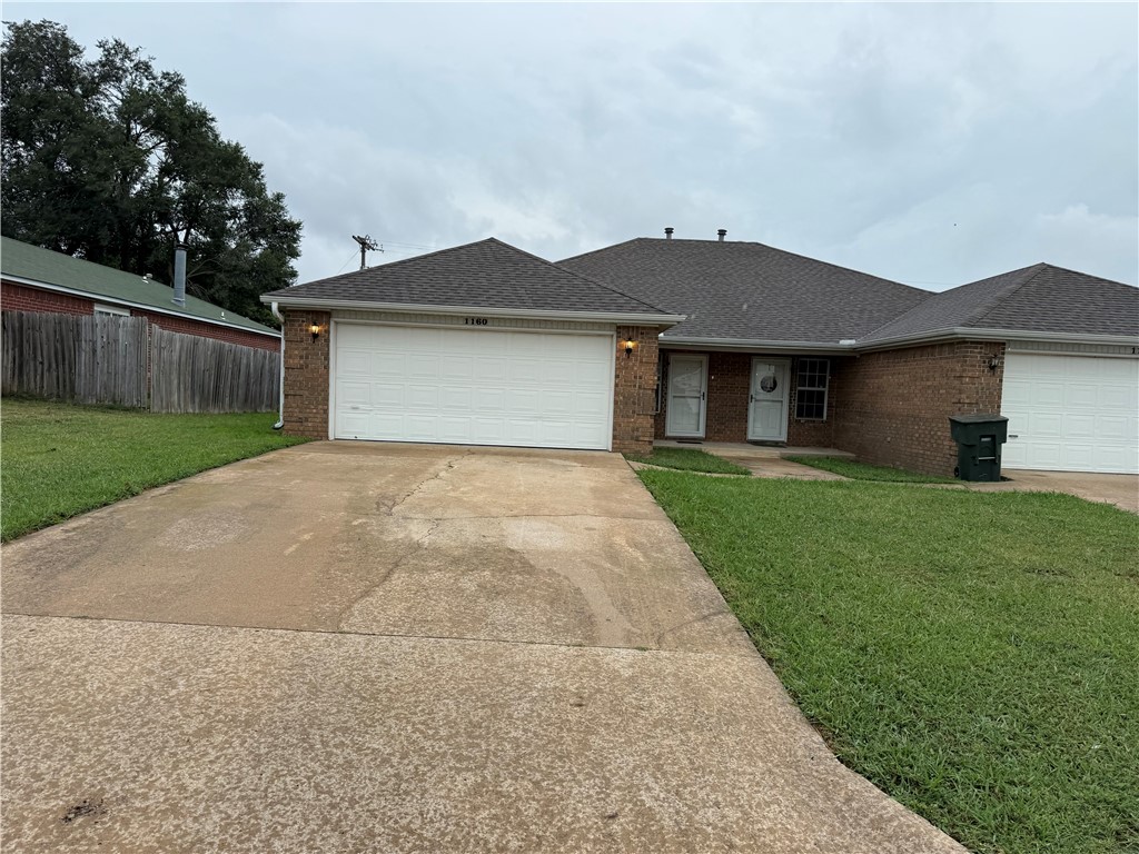 1,388+/- Sq Ft duplex offering 3 bedrooms, 2 baths, and a 2 car garage. This property features a large living room, updated appliances, fenced in backyard. Refrigerator, washer, dryer included