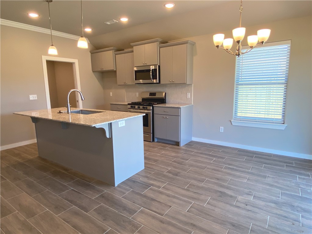 Beautiful New 3 bdr/2bath Brick home currently being built. This open plan is perfect for hosting friends and family! The living room has a gas fireplace and crown molding. The open kitchen has stainless steel appliances. Garage door opener & key pad entry, pull down attic storage. Covered patio has natural gas connection for grill or heater.