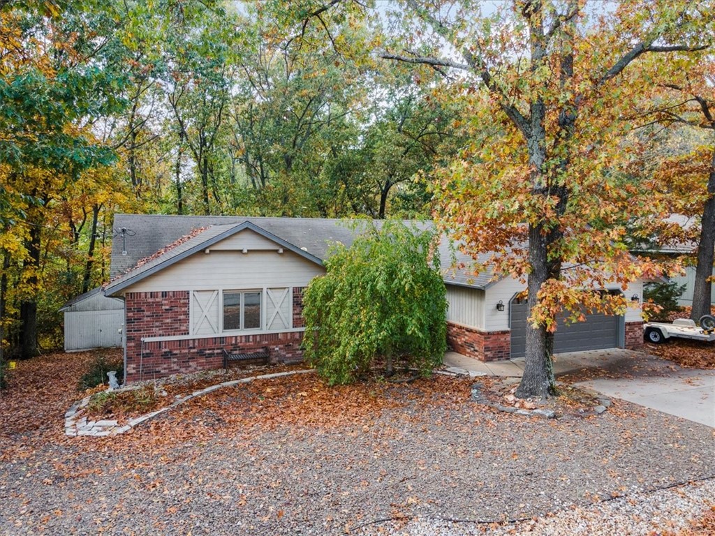 This 2X6 constructed home features an Office, 2 bedrooms plus a glass enclosed Sunroom. Great location with quick access to Trails, XNA, Hwy 71 and I49. Shopping, dining, business district all nearby. Good curb appeal. Beautiful wood casement windows encompass the living room for year round nature watching. Sola tubes provide a natural light without electricity. Primary Suite is spacious and the closet will knock your socks off so remove your shoes first! Second bedroom and office are split from Primary bedroom. The kitchen has a large wall of built-ins and beautiful solid oak quality cabinets. Newer SS appliance package. An all rock landscape allows more time for the activities you enjoy or a blank slate if you love plants, flowers and watching things grow and bloom. New garage door and low flo toilets. Home has a "good feel" and a very functional layout.