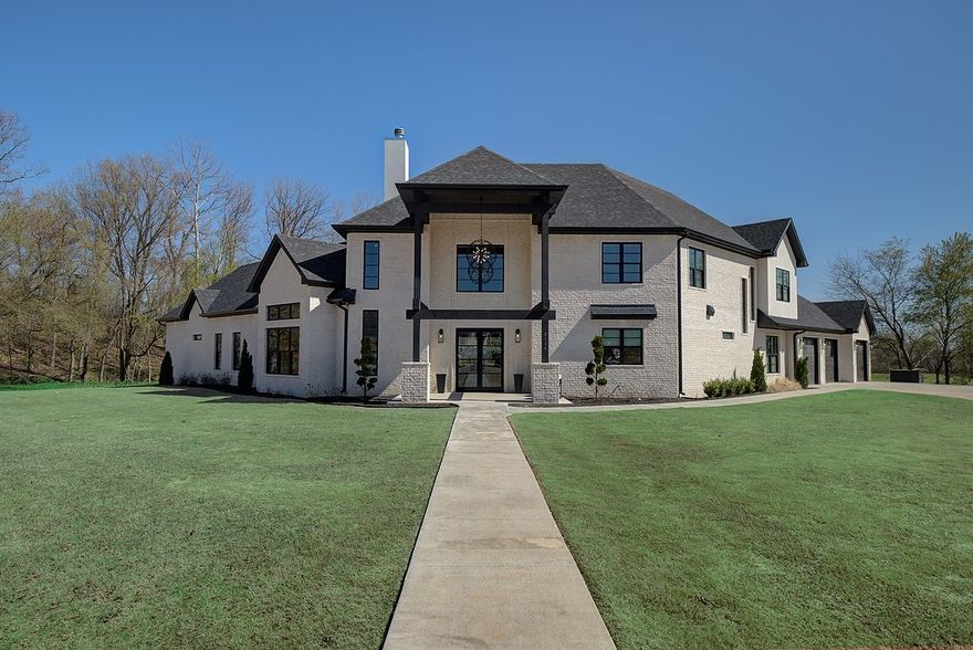 Location, Style and Quality construction! Amazing opportunity to own builders' personal custom home which is less that one year old located on new West Pleasant Grove RD. Absolutely beautiful design and floorpan sitting on a large 1.21 acre lot located in a cul-de-sac with a private, low traffic feel. Your forever home features 4360 total square feet, 5 bedrooms, 4.5 bath, state of the art kitchen w/48 inch stove-top, dual oven and large walk-in pantry. Also featuring the formal dining room, executive office, exercise room, man-cave, 3 car garage with added storage, not one but 2 bonus/family rooms and towering vaulted ceilings. The expansive covered back patio is perfect for entertaining and family fun while the backyard was designed with a future swimming pool in mind (Swimming Pool construction negotiable). Location, location, location! Bentonville Schools, Bentonville mailing address but Rogers taxes and utilities. Call today to set up your private showing! (Check VIDEO, attached Survey & Amenity list for more)