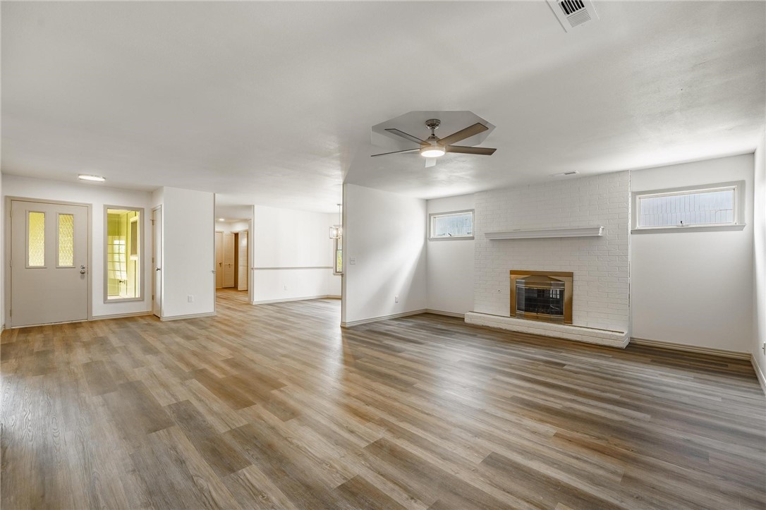 Home Sweet Home! Tucked in a small neighborhood, this home offers the perfect blend of style, space, and location. Located in the heart of Rogers, you are 10 minutes from Downtown Rogers or the Pinnacle Promenade area. Step inside to find the generous living space, beautifully designed for relaxation or entertaining. The upgraded kitchen offers plenty of storage and counter space, while the inviting living/dining area is perfect for family gatherings. The large bedrooms each have their own walk-in closets. The 3rd bedroom can be used as a flex space for an in-home office and/or second living area if not being used as a bedroom. Recent updates include: New flooring throughout, tiled showers, backsplash, fixtures, appliances, granite countertops, fresh paint on the interior and exterior of the home. Don't miss out on this opportunity!