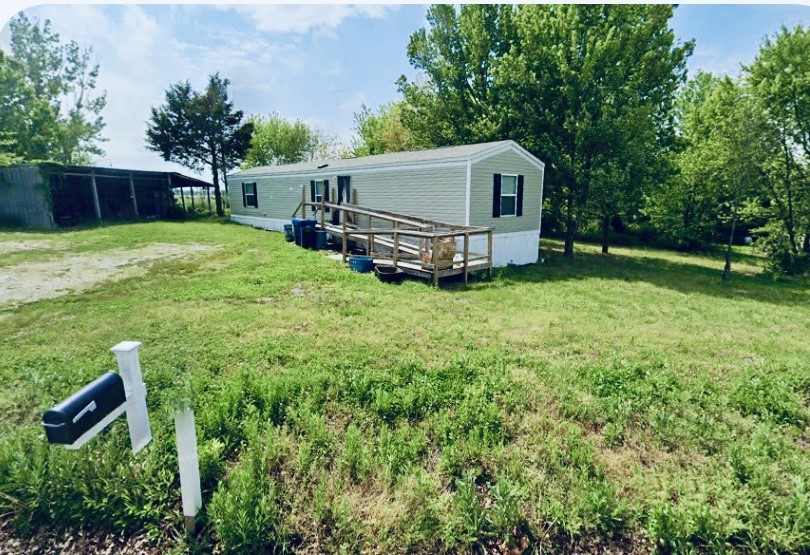 This is a transitional property being sold as "land only" - The 2019 mobile home in images currently sitting on the property has been recently sold and will be removed from the property shortly. Seller is offering a $7,000 credit with full offer to assist buyer with property clearing and clean-up. The .69 acres is priced very competitively for the area and it's potential. Property is just outside of city limits, located in the Bentonville School District, located only 1/2 mile from Gamble Elementary and Bentonville West High School with quick easy access to Hwy 49 and 72 and only 6 miles from downtown Bentonville.