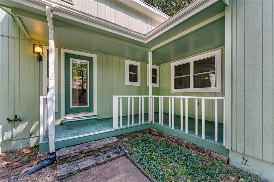 EAST FAYETTEVILLE LOCATION. COVETED East mid-century modern charmer - walking distance to Root School, Gulley Park, and trails. Soaring ceiling heights with ample natural light in living with charming side deck off eat-in kitchen made of Trex building materials. Native stone woodburning fireplace with blower. Home has been occupied by same family for past 30 years - HVAC 2021. Many other maintenance and updates to home: full bath remodel, exterior/interior windows. Preferred lender credit $3000. Ask your real estate professional for detailed amenities portfolio.