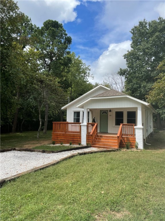 Location location location! Come tour this fully remodeled home in Fayetteville. This 2 bed, 1 bath house is only a 7 minute walk to the Fayetteville square! It has a large, private yard with new front and back porches. Walk to Dickson Street, Feed and Folly, Crisis Brewery, and The Razorback Greenway! Upgrades include: Central heat and air conditioning, New vaulted ceiling in the living room, New kitchen cabinets, New quartz counter tops in the kitchen, All new stainless steel appliances, Heart of Pine wood floors throughout which were just refinished (bathroom is tile), All new paint throughout the interior of the home, New front and back porches, All new light fixtures throughout, New tiled shower with glass door, New tile floors in the bathroom, New toilet, New vanity, New front and back doors. Siding & windows all new as well!
