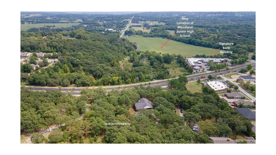 Looking for a ONE LEVEL home in a CENTRAL location with easy access to all of Northwest Arkansas? This beautiful home is situated on 1.61 acres and is 5 minutes from shopping/restaurants/medical/businesses! Over 3,100 sq ft of heated living space offers 4 bedrooms, 3 full bathrooms in a split floor plan, a sunroom, oversized living room that is open to an eat in kitchen, study, laundry, and a second living/dining/optional room! Amenities include engineered hardwood floors, double sided fireplace, lots of windows that provide natural light, Corian counter tops,  an ADA compliant bathroom, and a 2 car garage.  Don’t miss the mature trees and beautiful setting!  Zoned for Butterfield Elementary and Woodland Junior High. Seller is offering $10,000 toward buyers closing costs and pre paids with offer and acceptance!!!!