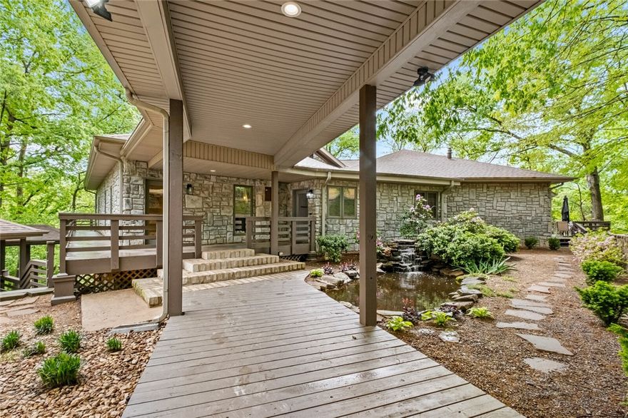 Discover sophistication and privacy at this elegant Bentonville estate home. Boasting an expansive 6,957sq ft of living space, this home features 4 luxurious bedrooms and 4 well-appointed bathrooms. The large lot ensures unmatched privacy, making it a personal haven. The opulent living areas are complemented by scenic views that capture the essence of this exquisite property. Each room has been meticulously designed, including a primary bedroom that serves as a retreat within your own home. Step inside to experience a unique speak-easy, perfect for entertaining or quiet evenings at home. Outside, the estate continues to impress with a pristine pool house, set amidst landscaped surroundings, offering a perfect blend of recreation and relaxation. The property's location is ideally situated near Bentonville's crown jewel, the Walmart Home Office Campus, providing both convenience and opportunity. This home isn’t just a place to live; it’s a lifestyle waiting to be cherished, life here is nothing short of exceptional.
