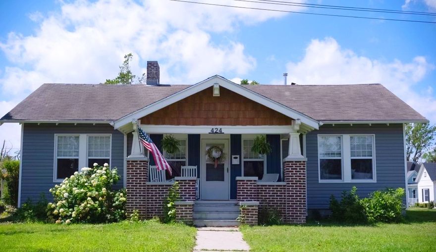 This home offers versatile living spaces, including a bonus room ideal for use as an office or sunroom, complemented by new lighting fixtures and ceiling fans throughout. Newest remodeled bathroom with the original bathtub. Home is close proximity to walk to downtown Rogers, The Railyard and Lake Atalanta. With its blend of classic charm and modern updates, this craftsman home is sure to captivate.
