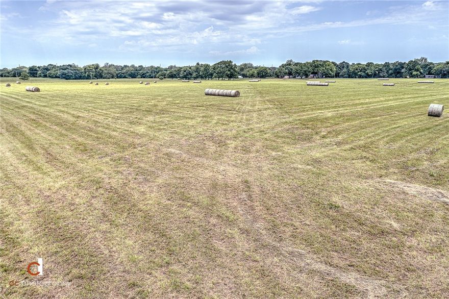 Flat and mostly cleared with creek access. Great for development potential or agricultural use. Less than a minute drive to Highway 12, Main Street in Gentry, and Gentry Blvd. Less than a mile away from Schuber Mitchell's new development, Grand Estates. Land has easement with SWEPCO on it. Has home on it that comes with purchase. Home not pictured, but is 40+ years old and 1794 square feet. Currently tenant occupied and not available for showing. Land is currently leased for agri purposes. Land lease and residential lease must be honored up to but not to exceed 60 days after closing per listing agreement. Property sold as-is with no repairs. Seller disclosure available.