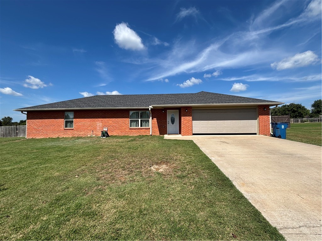 This solid home is the best of both worlds! You feel like you are in the country, and yet only minutes away from all that both Gentry and Siloam Springs offer. The lot is enormous, at .67 acres, with two outbuildings for tool storage, and a chicken coop should Buyer choose to accept it. The yard is clear and level, a real dream for the avid gardener. Inside, the home has LVP in all rooms except the bedroom, which have carpet. Two of the three bedrooms feature walk-in closets. The eat-in kitchen has beautiful rustic cabinets and granite countertops. If all those cabinets are not enough storage, there is a pantry just off the laundry room. The dishwasher is brand new, it still has the plastic on it. The refrigerator and washer and dryer all convey with the home. This house checks all the boxes, perfect for the growing family or for downsizing in peace and tranquility. Don't miss out on this one!